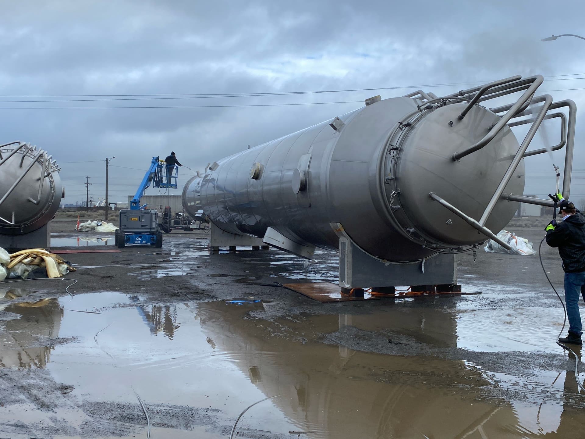 Precision Pressure Washing on Industrial Tank image